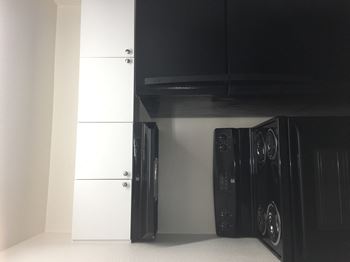 Black appliances at Alta Vista Apartments in Phoenix AZ